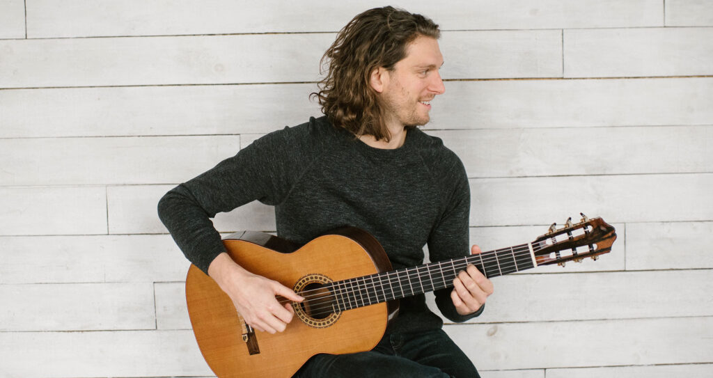 Musician Jeremy Verwys playing the Guitar